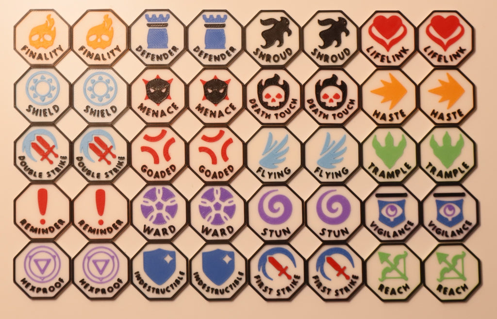 Full set of Whiteout Tokens: Finality, Defender, Shroud, Lifelink, Shield, Menace, Death Touch, Haste, Double Strike, Goaded, Flying, Trample, Reminder, Ward, Stun, Vigilance, HexProof Indestructible, First Strike Reach (missing prepared)