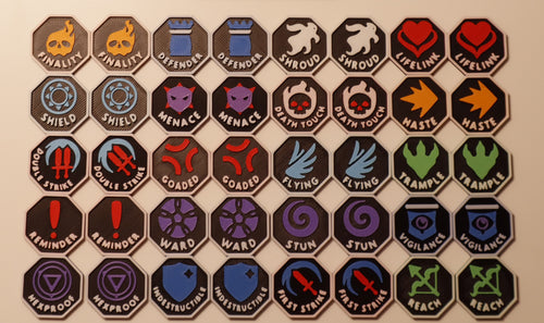 Black Plastic Tokens: Finality, Defender, Shroud, Lifelink, Shield, Menace, Death Touch, Haste, Double Strike, Goaded, Flying, Trample, Reminder, Ward, Stun, Vigilance, Hexproof, Indestructible, First Strike, Reach